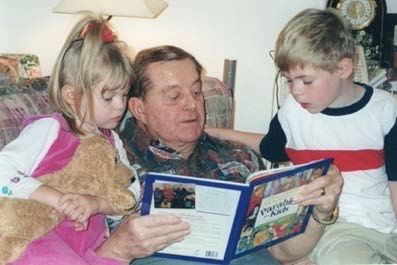 Bill reading to children